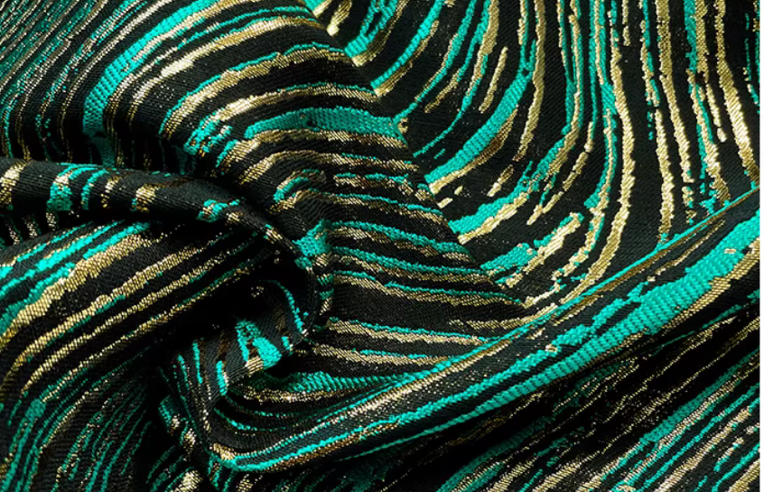 High-gloss peacock green midi skirt with a peacock feather texture design, a retro and stylish look. Made of polyester fiber, it's perfect for autumn and winter.（SAW0006)--Sold Out